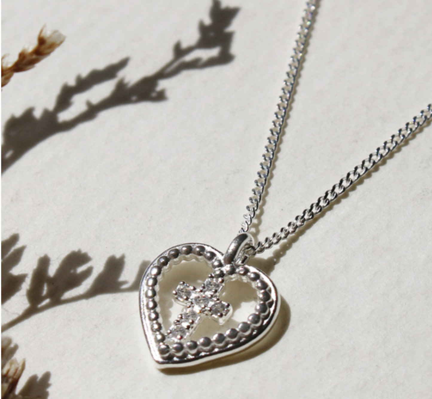 Sterling Silver Base: Cross-in-a-heart Necklace