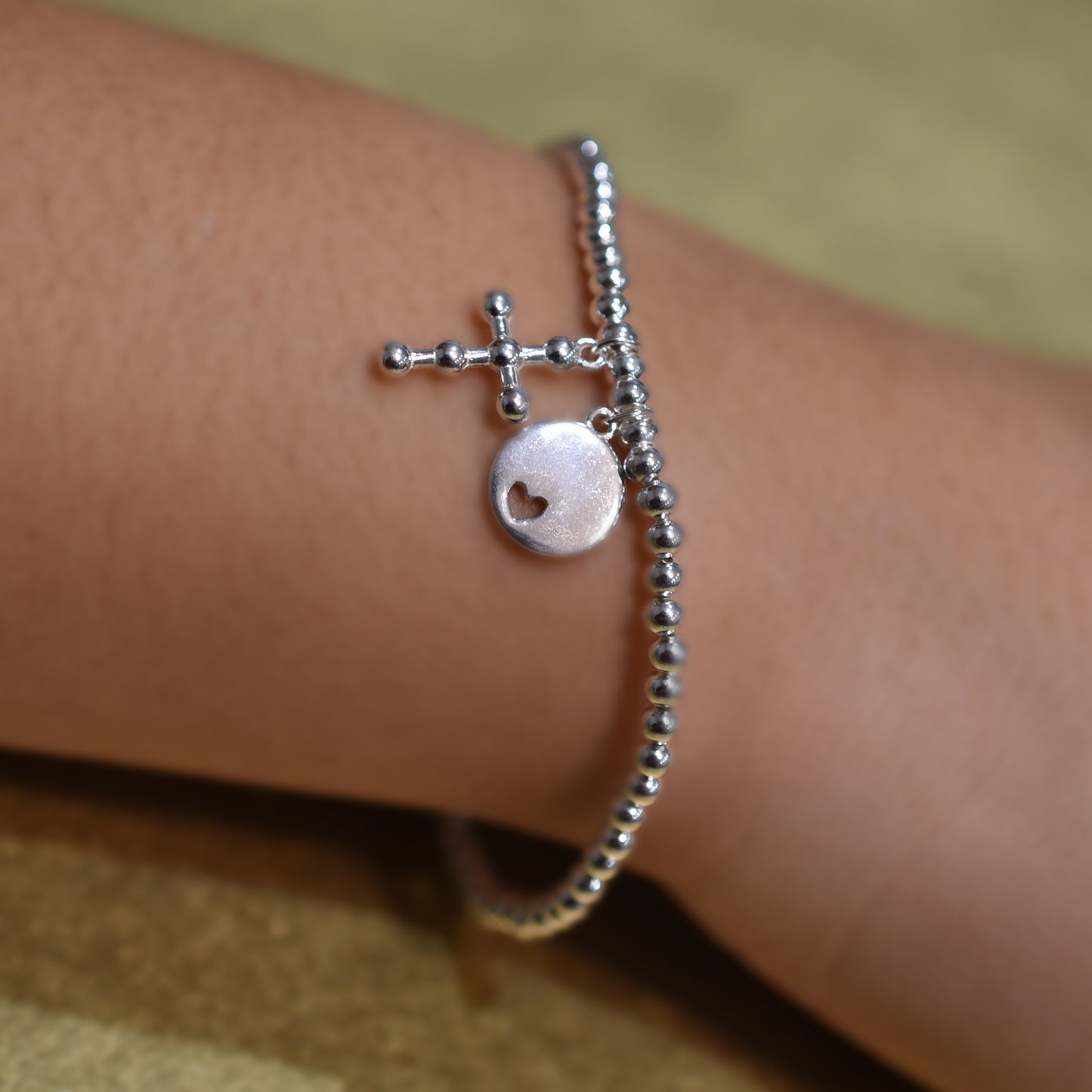 Sterling Silver Base: Petite Heart Disc Cross Bracelet